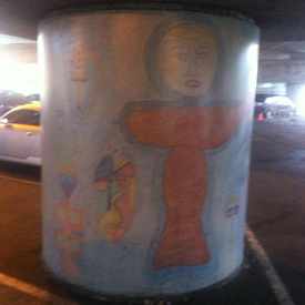 Photo of Mural Of Man Walking Child At Lake Merritt